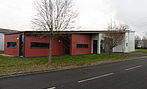 Batiment avec bureaux, show room et stockage